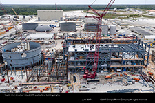 Vogtle Unit 4 nuclear island (left) and turbine building (right).