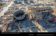 An aerial view of Unit 4 nuclear island and turbine building.