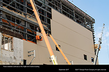 Panel installation continues on the Vogtle Unit 3 turbine building.